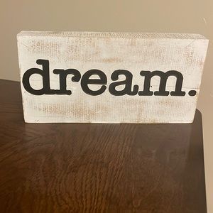 Dream sign on white distressed wood